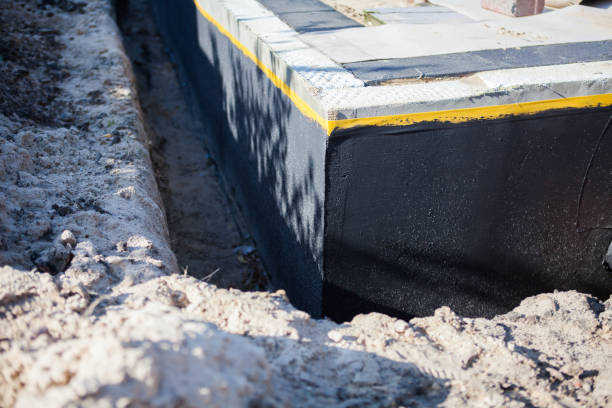 Professional Emergency Waterproofing technician working in Harwood, MD